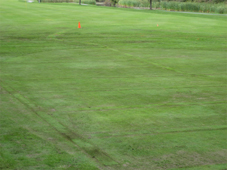This green is complete and will be ready for play after a bit of water washes the dirt away.