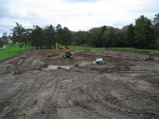 Excavation of the irrigation pond site begins.