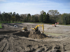 The irrigation pond site excavation progresses.