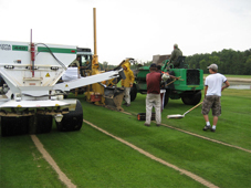 Slit drainage installation crew.
