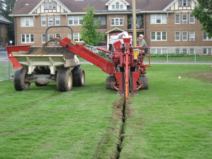 Trenching collector for slit drain installation.